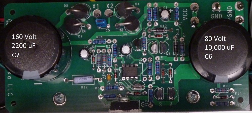 power supply pcb assembled closeup showing C7 and C6 values